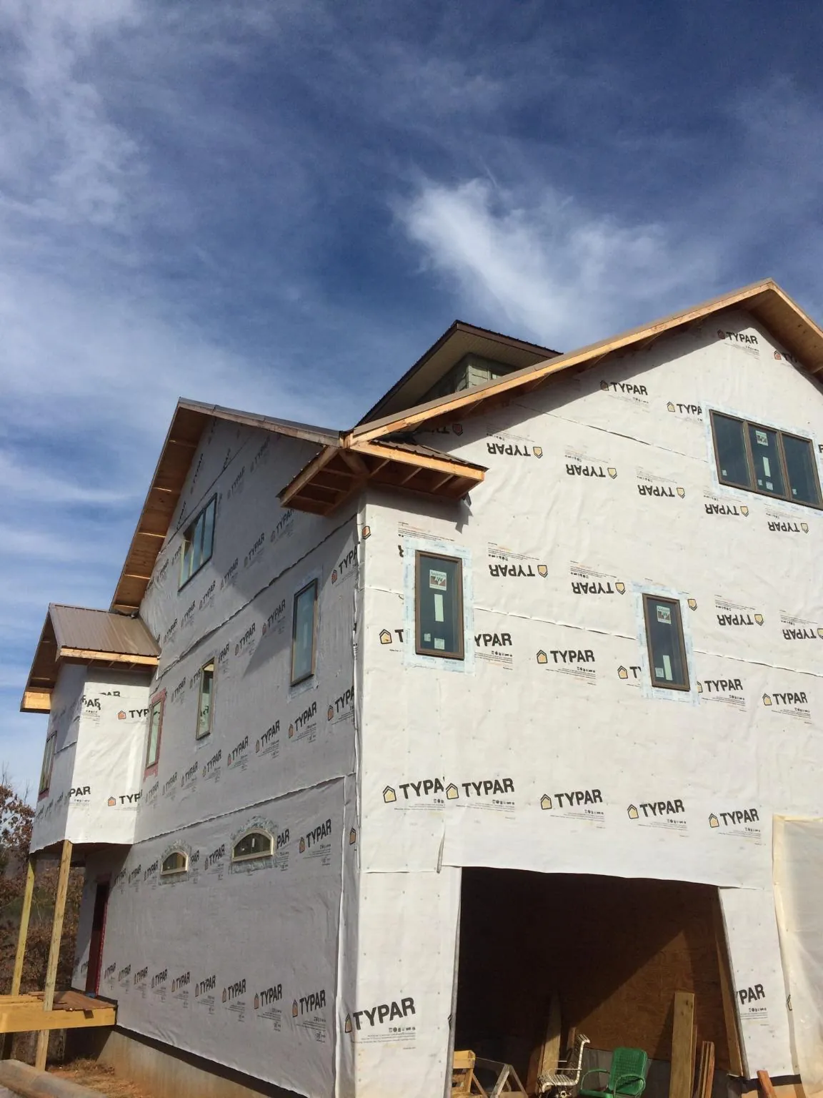 Stick built house wrapped in Typar with new roof framing and dormers in Adairville